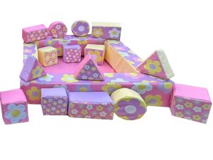 Soft play set with mixed pastel colours and flower themed artwork